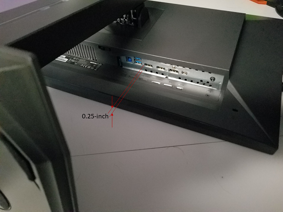 Inputs hidden under monitor with no space to plug in cables