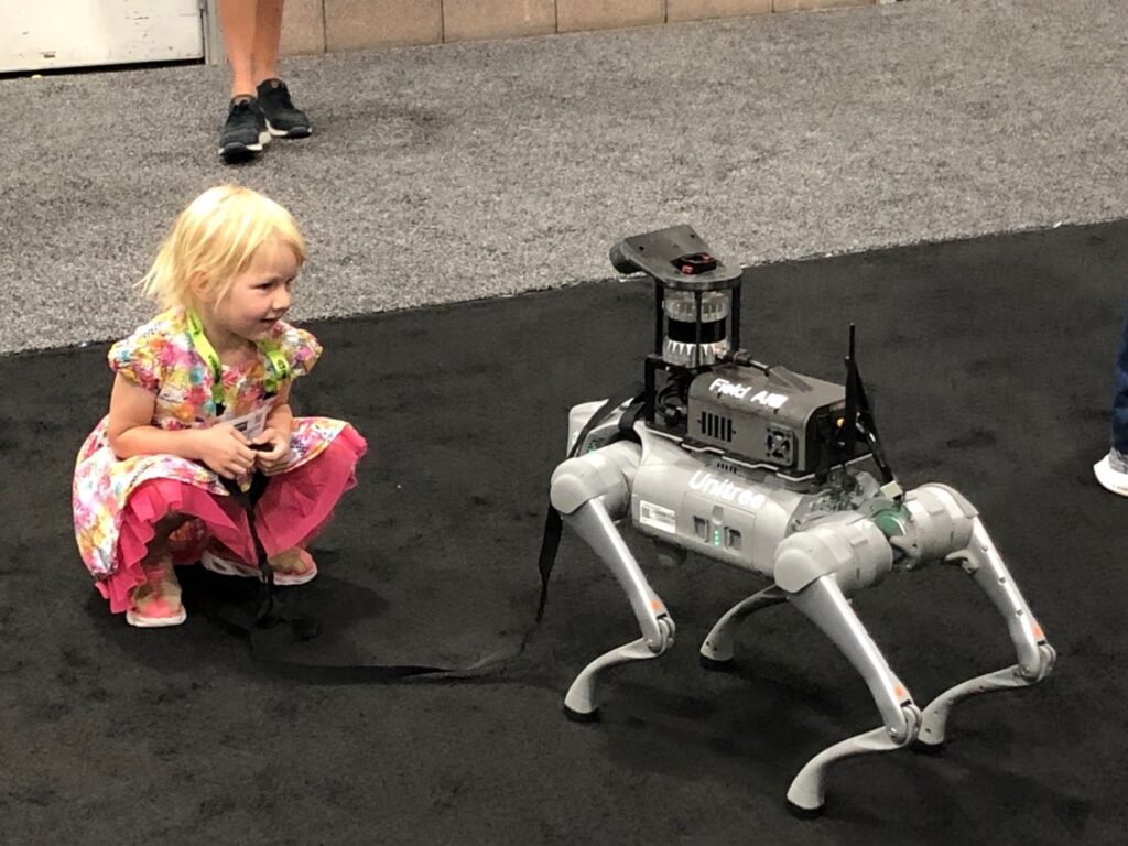 Girl with robot dog